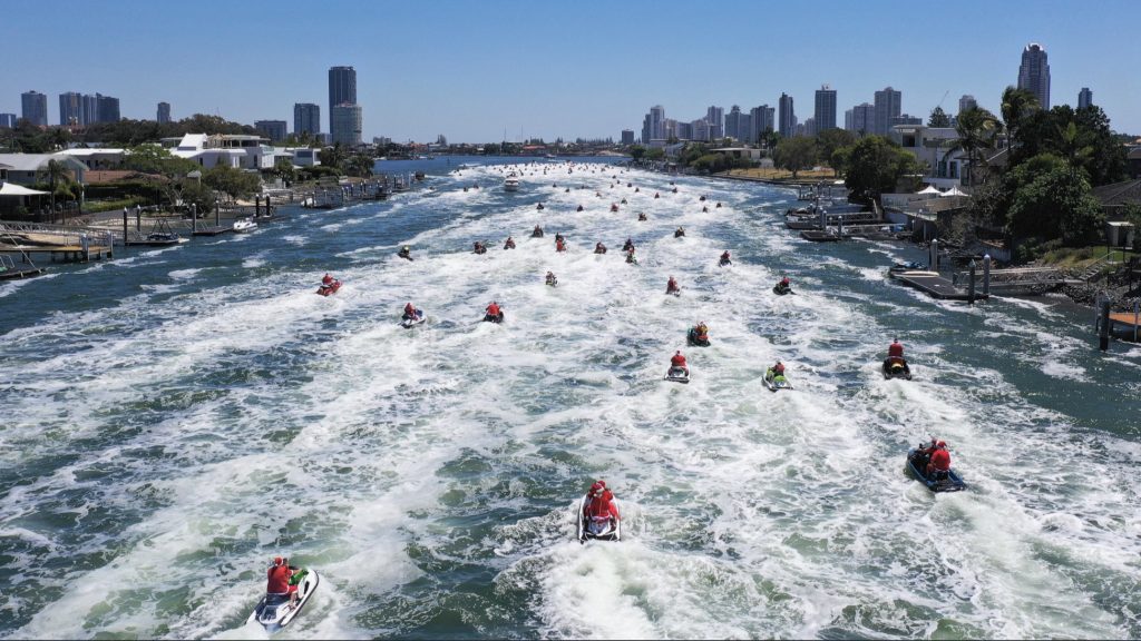 Participants dressed as Santa for the Gold Coast Christmas Jetski Parade 2025