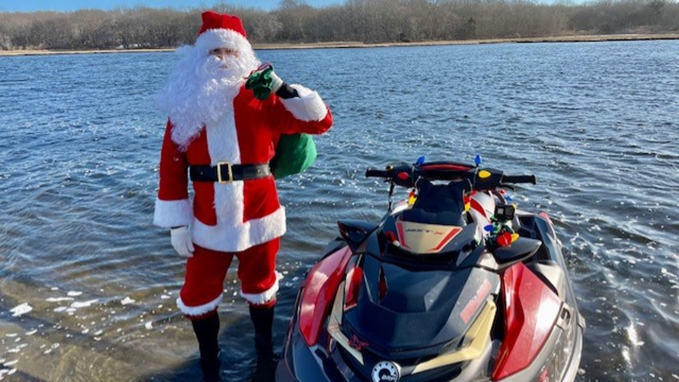 Jetskis cruising along Broadwater and Chevron Island during the Gold Coast Christmas Jetski Parade 2025