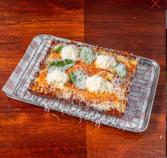 Wood-fired pizza served at FRANCS JR 