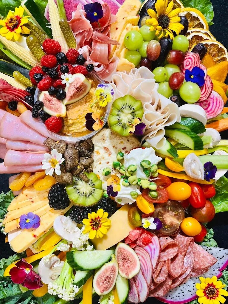 Fresh grazing platter with artisan cheese and seasonal fruit