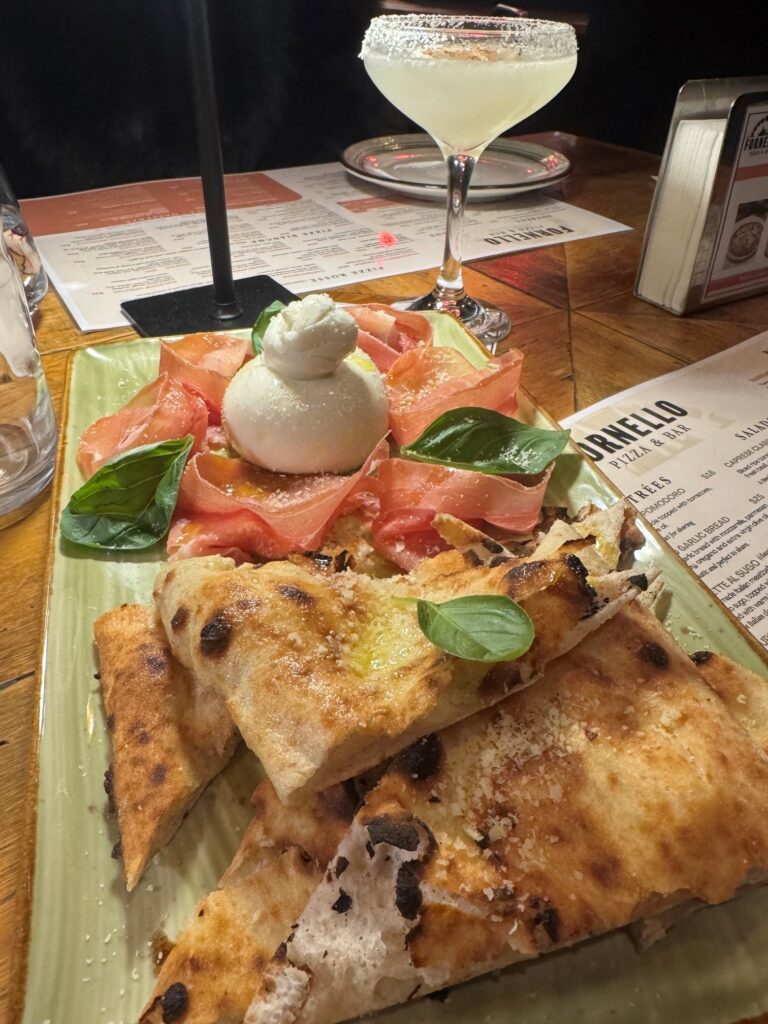 Creamy burrata cheese paired with aged Prosciutto Crudo, served with freshly baked focaccia.