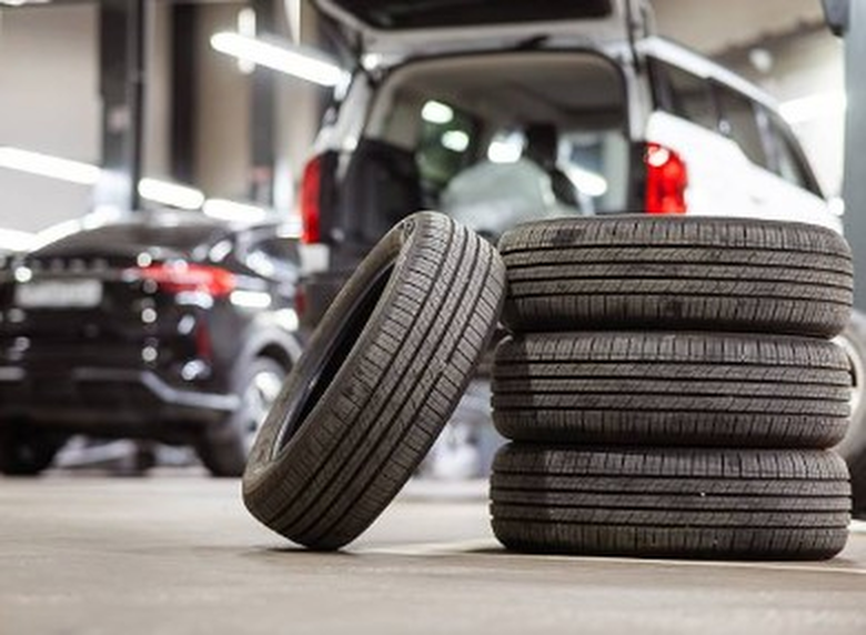 Rows of new and used tyres on display at Southport Budget Tyres