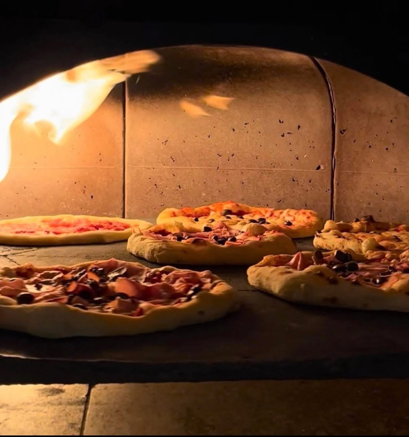 Custom wood-fired pizza oven at Sapori Italian restaurant, Clear Island Waters Gold Coast