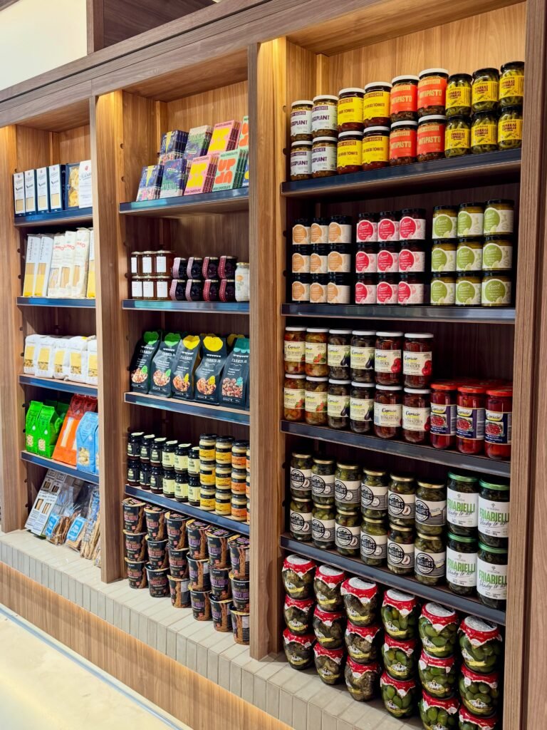 Pantry aisle at Mamma G’s Deli Coolangatta stocked with Italian pasta, tomatoes, olive oils and preserves